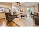 Spacious living room offering a seamless transition between the kitchen, dining area, and outdoor deck at 2104 Vineyard Dr, Castle Rock, CO 80104