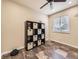 Versatile room with unique tile floor, built-in storage, offering flexible space for various activities at 2104 Vineyard Dr, Castle Rock, CO 80104
