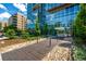Modern building exterior with large windows, landscaped walkway, and clear signage at 4200 W 17Th Ave # 212, Denver, CO 80204