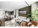 Open floor plan features living room, dining area, and modern kitchen with large island at 4200 W 17Th Ave # 212, Denver, CO 80204