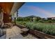 This expansive patio features an array of green landscaping, cozy seating, and an attractive outdoor dining area at 4200 W 17Th Ave # 212, Denver, CO 80204