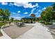 Outdoor picnic area with tables and a gazebo, surrounded by green lawns and trees, perfect for gatherings at 4200 W 17Th Ave # 212, Denver, CO 80204
