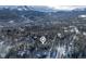 Aerial view of a home in a snowy mountain neighborhood at 1140 Ski Hill Rd # 25, Breckenridge, CO 80424