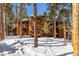 Attractive wood-sided condo building nestled in snowy woods at 1140 Ski Hill Rd # 25, Breckenridge, CO 80424
