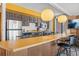 Bright kitchen features stainless steel appliances and a breakfast bar at 1140 Ski Hill Rd # 25, Breckenridge, CO 80424