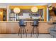 Bright kitchen features stainless steel appliances and a breakfast bar at 1140 Ski Hill Rd # 25, Breckenridge, CO 80424
