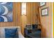 Living room with wood paneling and mid-century modern decor at 1140 Ski Hill Rd # 25, Breckenridge, CO 80424