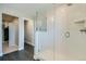 Modern bathroom featuring a frameless glass shower, subway tile, and sleek fixtures for a spa-like experience at 6877 Bryant Ct, Denver, CO 80221
