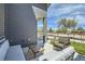 Comfortable outdoor patio with modern seating and a view of the surrounding neighborhood at 6877 Bryant Ct, Denver, CO 80221