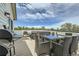 Outdoor rooftop deck featuring comfortable seating, a grill, and scenic views for outdoor entertaining and relaxation at 6877 Bryant Ct, Denver, CO 80221
