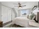 Bright bedroom featuring a comfortable bed and ample natural light at 7152 E Hinsdale Pl, Centennial, CO 80112
