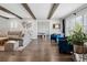 Spacious living room boasts hardwood floors, neutral tones, and modern decor at 7152 E Hinsdale Pl, Centennial, CO 80112