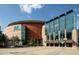 External view of Ball Arena. Modern architecture with glass and metal. Sports, entertainment, and sustainability at 907 E 22Nd Ave, Denver, CO 80205