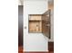 A hidden gem: a built-in pantry with a unique roll-top door at 907 E 22Nd Ave, Denver, CO 80205