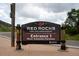 Entrance to Red Rocks Park and Amphitheatre, showcasing the park's welcome sign at 907 E 22Nd Ave, Denver, CO 80205