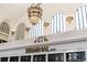 Elegant Terminal Bar interior featuring classic lighting fixtures and arched windows in a historic setting at 907 E 22Nd Ave, Denver, CO 80205