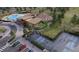 Aerial view showcasing the community pool, pickleball courts, amphitheater, and clubhouse at 16478 W 92Nd Pl, Arvada, CO 80007