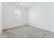 Bright bedroom with a window showcasing natural light at 16478 W 92Nd Pl, Arvada, CO 80007