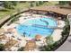Resort-style pool with lounge chairs, umbrellas, and Gathering-friendly features at 16478 W 92Nd Pl, Arvada, CO 80007