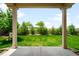 View of the home's manicured backyard and lawn as seen from the covered patio at 1339 Sidewinder Cir, Castle Rock, CO 80108