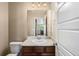 Clean half bathroom with a sleek vanity, updated fixtures, and neutral paint at 1339 Sidewinder Cir, Castle Rock, CO 80108