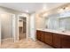 Spacious bathroom with dual sinks, walk-in closet, and separate shower at 1339 Sidewinder Cir, Castle Rock, CO 80108