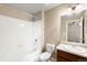 Modern bathroom with a shower/tub combo and updated vanity with sink at 1339 Sidewinder Cir, Castle Rock, CO 80108