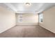 A neutral bedroom featuring two large windows for plenty of natural light at 1339 Sidewinder Cir, Castle Rock, CO 80108