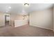Spacious loft area with neutral walls and carpet is perfect for a media room at 1339 Sidewinder Cir, Castle Rock, CO 80108
