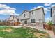 Backyard with a patio area, grill, and seating area for outdoor relaxation at 24356 E Powers Ave, Aurora, CO 80016
