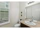Powder bath featuring a pedestal sink, and window with privacy blinds at 24356 E Powers Ave, Aurora, CO 80016
