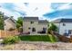The private backyard features a well-maintained lawn, a patio, and a fence, offering a tranquil outdoor space at 5972 S Zante Way, Aurora, CO 80015