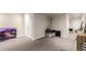 View of a finished basement area featuring neutral carpet, a utility closet and recessed lighting at 5972 S Zante Way, Aurora, CO 80015