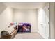The finished basement area boasts neutral carpet, recessed lighting, and ample storage space at 5972 S Zante Way, Aurora, CO 80015