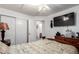 Bedroom featuring natural light and access to ensuite bathroom and closet at 5972 S Zante Way, Aurora, CO 80015