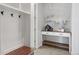 Welcoming hallway features a built-in bench and storage, adding functionality and style at 10049 Isle St, Parker, CO 80134