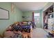 This cozy bedroom includes many toys and has ample storage space at 10781 Moore St, Westminster, CO 80021