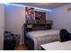 Cozy bedroom with a unique headboard and LED lighting, showcasing a relaxed and inviting atmosphere at 1134 Del Mar Pkwy, Aurora, CO 80010