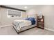 Bedroom with neutral decor, window with blinds, and cozy bed with decorative pillows and blanket at 230 E Highline Cir # 101, Centennial, CO 80122
