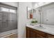Updated bathroom with sleek vanity, tiled shower, and modern fixtures at 3695 S Kittredge St # C, Aurora, CO 80013