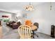 Comfortable living room with fireplace, hardwood floors, and decorative lighting at 3695 S Kittredge St # C, Aurora, CO 80013