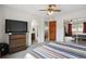 Primary bedroom featuring ensuite bathroom, closet and neutral wall color at 3695 S Kittredge St # C, Aurora, CO 80013