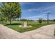 Expansive green park with walking paths, mature trees, and natural stone markers at 3695 S Kittredge St # C, Aurora, CO 80013