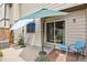 Outdoor patio with patio furniture and lush landscaping at 3695 S Kittredge St # C, Aurora, CO 80013