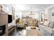 Open concept living and dining area features hardwood flooring, lots of natural light, and modern fixtures at 89 Oneida St, Denver, CO 80230