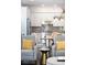 Open-concept layout seamlessly connects the living room and kitchen, enhancing natural light at 89 Oneida St, Denver, CO 80230
