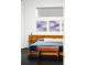 Well-lit main bedroom featuring a platform bed with modern design and decor at 89 Oneida St, Denver, CO 80230