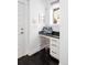 Efficient office nook with granite desktop, under cabinet storage, and a modern chair at 89 Oneida St, Denver, CO 80230