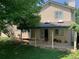 Relaxing backyard patio with covered seating area, perfect for enjoying the outdoors at 11600 E Adriatic Pl, Aurora, CO 80014