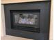 Close up on the clean-burning fireplace with gas logs at 11600 E Adriatic Pl, Aurora, CO 80014